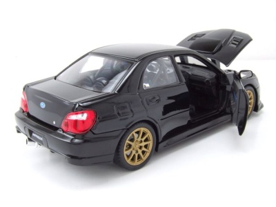 Subaru Impreza WRX STI 2010 schwarz Modellauto 1:24 Welly