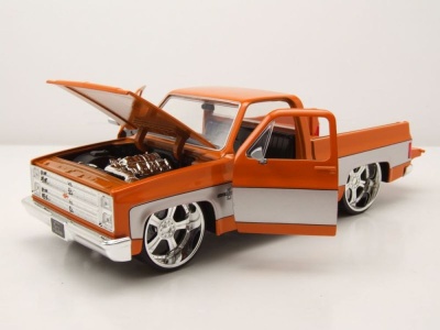 Chevrolet C-10 Pick Up 1985 orange grau Modellauto 1:24 Jada Toys