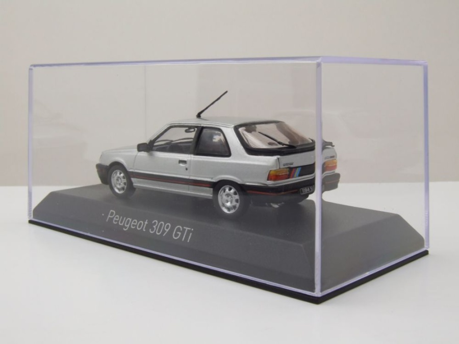 Modellauto Peugeot 309 GTi 1987 grau mit PTS Deko 1:43 Norev