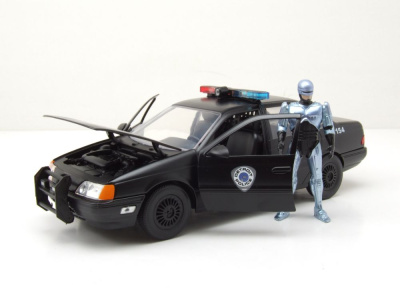 Ford Taurus Police 1986 schwarz RoboCop mit Figur Modellauto 1:24 Jada Toys