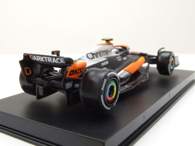 McLaren MCL60 Formel 1 2023 #4 Norris mit Figur Modellauto 1:43 Bburago