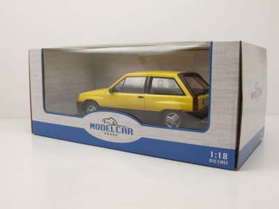 Opel Corsa A SR 1983 gelb Modellauto 1:18 MCG
