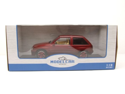 Opel Corsa A Custom 1983 dunkelrot metallic Modellauto 1:18 MCG