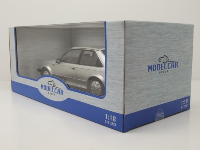 Opel Kadett D GTE 1983 silber Modellauto 1:18 MCG