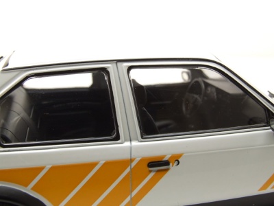 Opel Kadett D SR 1983 weiß gelb Modellauto 1:18 MCG