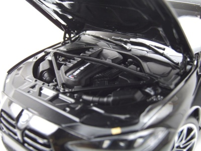 BMW M4 2024 schwarz metallic Modellauto 1:18 Minichamps