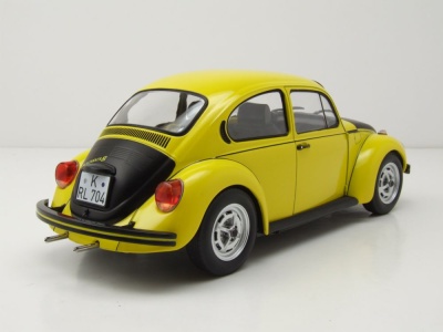 VW 1303 Käfer 1973 gelb schwarz Modellauto 1:18 Norev