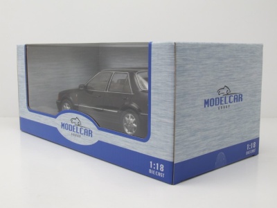 Ford Orion MKII 1986 RHD schwarz Modellauto 1:18 MCG