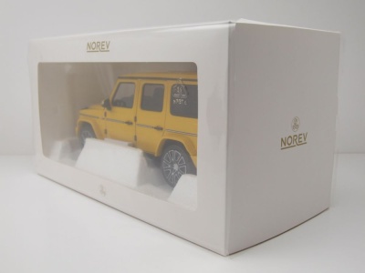 Mercedes G-Klasse G-Modell 2024 sonnen gelb Modellauto 1:18 Norev