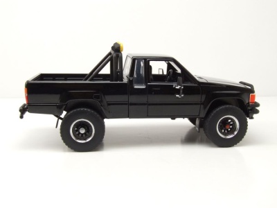 Toyota SR5 Pick Up 1985 schwarz mit Skateboard Zurück in die Zukunft Modellauto 1:24 Jada Toys