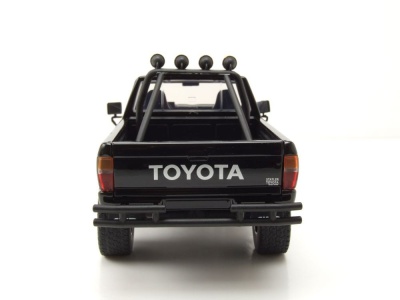 Toyota SR5 Pick Up 1985 schwarz mit Skateboard Zurück in die Zukunft Modellauto 1:24 Jada Toys